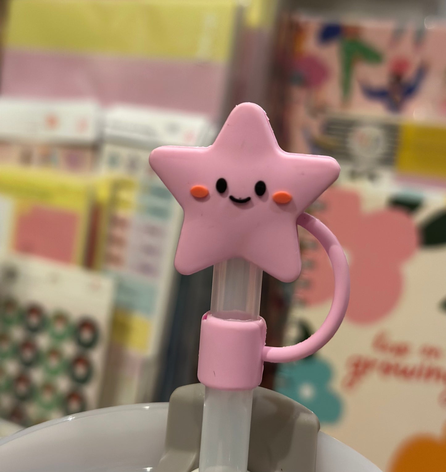 Tapón estrella sonriente rosa 10mm